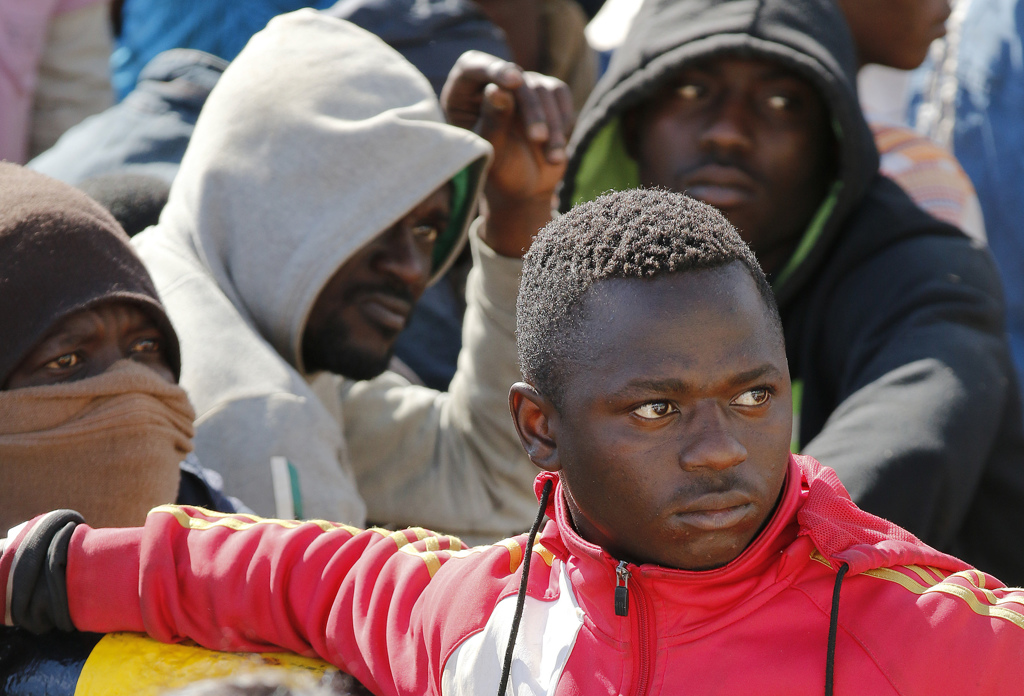 Migrants arrive at the Sicilian harbour of Pozzallo